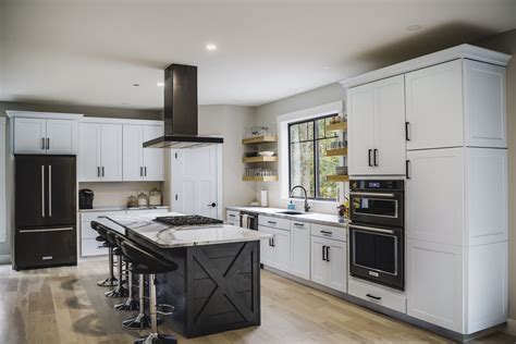 grey cabinets with black stainless steel appliances|black fridge in white kitchen.